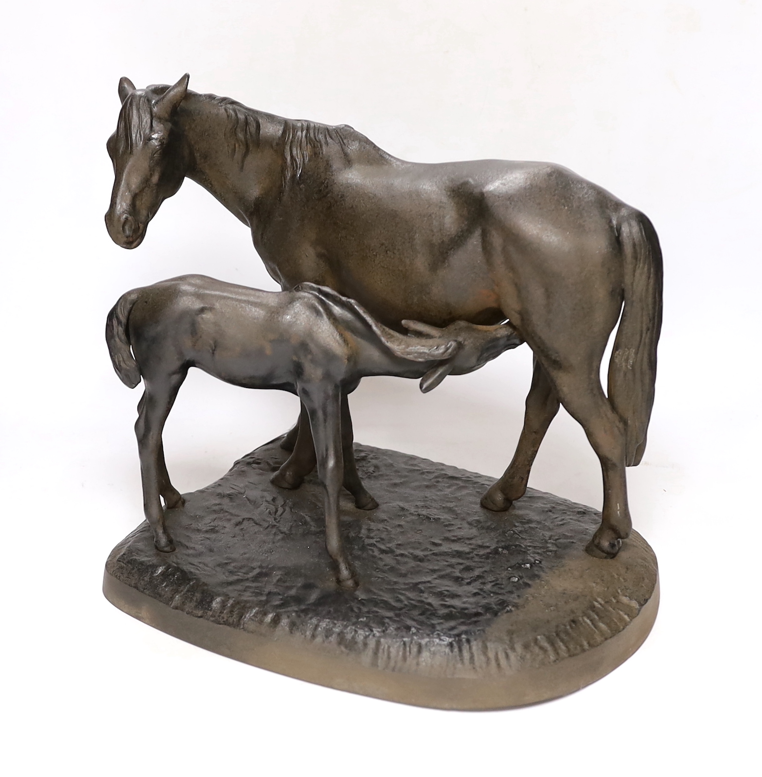A 1970's Russian cast iron horse group of mare and foal, 35cm wide